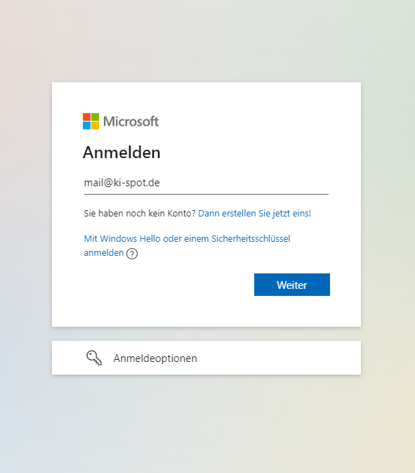 Eine deutschsprachige Anmeldeseite von Microsoft, die nach einer E-Mail-Adresse fragt, um sich anzumelden, mit Optionen zum Erstellen eines Kontos, zur Anmeldung mit Windows Hello oder einem Sicherheitsschlüssel und einer Schaltfläche mit der Aufschrift Weiter.
